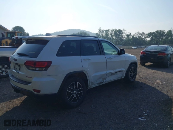 2017 Jeep Grand Cherokee Trailhawk with VIN 1C4RJFLG2HC670868, listed as a IAAI auction lot 42711041 with 129,465 mi miles and . Bid and sale history available at DreamBid. Image 4.