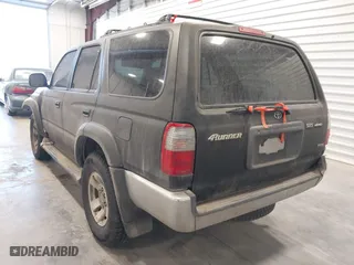2000 Toyota 4Runner SR5 with VIN JT3HN86R0Y0276977, listed as a IAAI auction lot 41884243 with 375,779 mi miles. Bid and sale history available at carsss.com. Image 3.