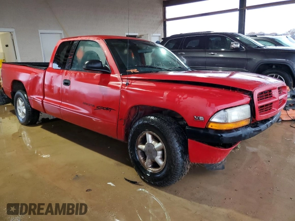 1999 Dodge Dakota SLT with VIN 1B7GL22X4XS210675, listed as a Copart auction lot 85746454 with 203,884 mi miles and Salvage Title. Bid and sale history available at carsss.com. Image 4.