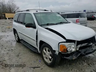 2004 GMC Envoy SLT with VIN 1GKDT13SX42404837, listed as a Copart auction lot 84515994 with 184,153 mi miles and Salvage Title. Bid and sale history available at carsss.com. Image 11.