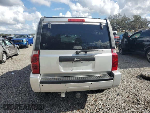 2010 Jeep Commander Sport z VIN 1J4RH4GK1AC125470, wystawiony jako Copart lot #85075094 z przebiegiem 139 328 mil mil oraz Szkoda całkowita • Salvage title. Historia ofert i sprzedaży dostępna na DreamBid. Obrazek 6.