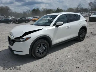 2021 Mazda CX-5 Touring with VIN JM3KFBCM4M0486469, listed as a Copart auction lot 51708075 with 57,182 mi miles and Salvage Title. Bid and sale history available at carsss.com. Image 1.