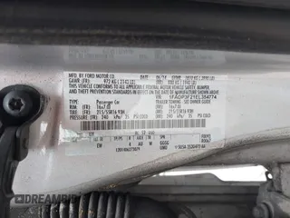 2014 Ford Focus SE with VIN 1FADP3F21EL354774, listed as a IAAI auction lot 41972701 with 115,046 mi miles. Bid and sale history available at carsss.com. Image 9.