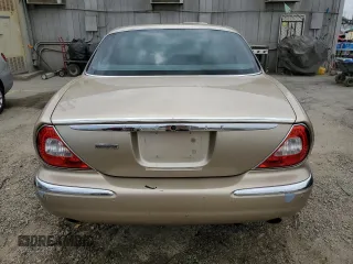 2004 Jaguar XJ with VIN SAJEA74C84SG03857, listed as a Copart auction lot 62156875 with 92,649 mi miles and Salvage title. Bid and sale history available at DreamBid. Image 6.