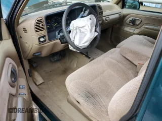 1995 GMC Sierra 1500 z VIN 2GTEK19K3S1511767, wystawiony jako Copart lot #51977295 z przebiegiem 215 667 mil mil oraz Szkody całkowita. Historia ofert i sprzedaży dostępna na DreamBid. Obrazek 8.