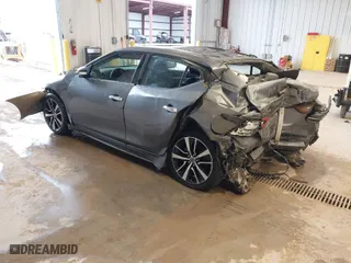 2021 Nissan Maxima SV with VIN 1N4AA6CV9MC513527, listed as a IAAI auction lot 40056232 with 54,583 mi miles. Bid and sale history available at carsss.com. Image 3.