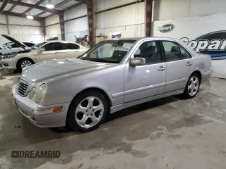 2002 Mercedes-Benz E-Class with VIN WDBJF65J52B497463, listed as a Copart auction lot 82372014 with 201,131 mi miles and Salvage Title. Bid and sale history available at carsss.com. Image 1.