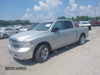 2015 Ram 1500 Big Horn with VIN 1C6RR7LG3FS509244, listed as a IAAI auction lot 42384583 with 216,899 mi miles and . Bid and sale history available at DreamBid. Image 2.