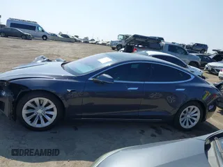2019 Tesla Model S 75D with VIN 5YJSA1E25KF304371, listed as a IAAI auction lot 42349856 with 64,788 mi miles and . Bid and sale history available at DreamBid. Image 15.