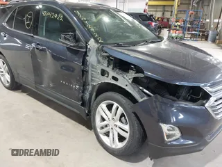 2019 Chevrolet Equinox Premier z VIN 3GNAXNEVXKS500672, wystawiony jako IAAI lot #42042922 z przebiegiem 77 440 mil mil oraz . Historia ofert i sprzedaży dostępna na DreamBid. Obrazek 6.
