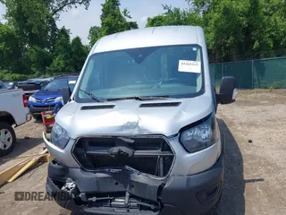 2021 Ford Transit z VIN 1FTYE1CG8MKA98319, wystawiony jako IAAI lot #42265312 z przebiegiem 85 302 mil mil oraz . Historia ofert i sprzedaży dostępna na DreamBid. Obrazek 13.