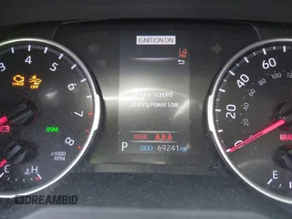 2019 Toyota RAV4 XLE with VIN JTMP1RFV8KD025971, listed as a IAAI auction lot 42673361 with 69,241 mi miles and . Bid and sale history available at DreamBid. Image 16.