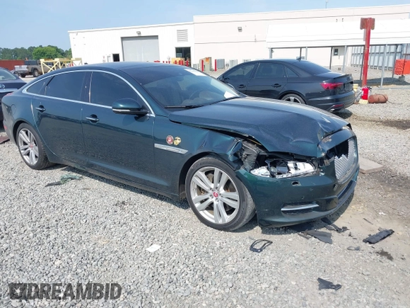 2014 Jaguar XJ Portfolio z VIN SAJWA2GZ4E8V60315, wystawiony jako IAAI lot #42293880 z przebiegiem 97 712 mil mil oraz . Historia ofert i sprzedaży dostępna na DreamBid. Obrazek 1.