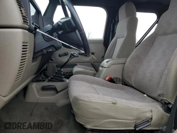 2004 Jeep Wrangler Rubicon with VIN 1J4FA69S24P743345, listed as a Copart auction lot 87067154 with 153,783 mi miles and Salvage Title. Bid and sale history available at carsss.com. Image 7.