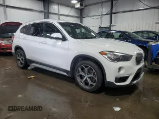 2018 BMW X1 xDrive28i with VIN WBXHT3C30J5L33646, listed as a Copart auction lot 46707525 with 82,656 mi miles and Salvage Title. Bid and sale history available at carsss.com. Image 4.