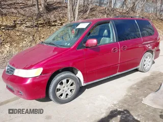 2003 Honda Odyssey EX-L with VIN 5FNRL18923B130410, listed as a IAAI auction lot 41814211 with 209,335 mi miles and . Bid and sale history available at DreamBid. Image 17.