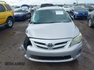 2011 Toyota Corolla L with VIN 2T1BU4EE5BC594215, listed as a IAAI auction lot 41802263 with 126,457 mi miles and . Bid and sale history available at DreamBid. Image 12.