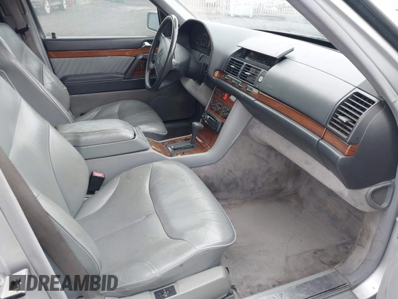 1994 Mercedes-Benz S with VIN WDBGA43E0RA162923, listed as a IAAI auction lot 42012249 with 107,498 mi miles and . Bid and sale history available at DreamBid. Image 5.