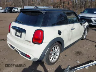 2014 MINI Hardtop S with VIN WMWXM7C57ET987122, listed as a IAAI auction lot 41780127 with 78,567 mi miles and . Bid and sale history available at DreamBid. Image 4.