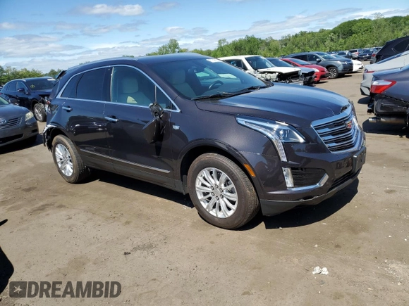 2018 Cadillac XT5 AWD with VIN 1GYKNBRS8JZ203963, listed as a Copart auction lot 57243165 with 18,407 mi miles and Salvage title. Bid and sale history available at DreamBid. Image 4.