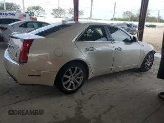 2009 Cadillac CTS AWD w/1SB with VIN 1G6DT57V990151233, listed as a Copart auction lot 71209784 with 96,260 mi miles and Non Repairable. Bid and sale history available at carsss.com. Image 3.