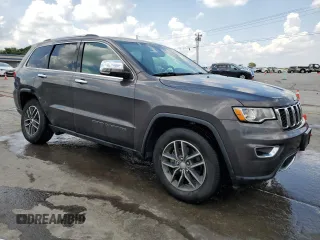 2018 Jeep Grand Cherokee Limited with VIN 1C4RJEBG1JC300335, listed as a Copart auction lot 61853325 with 107,137 mi miles and Salvage title. Bid and sale history available at DreamBid. Image 4.