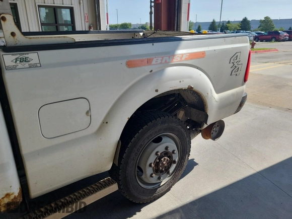 2011 Ford F-250 XL with VIN 1FT7X2B63BEC07690, listed as a IAAI auction lot 42827998 with 416,255 mi miles and . Bid and sale history available at DreamBid. Image 34.
