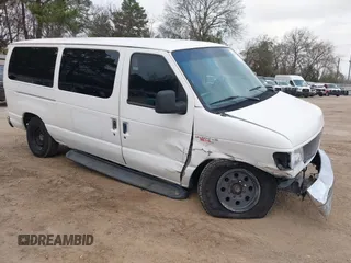2003 Ford Econoline Passenger XL with VIN 1FBNE31L63HA12648, listed as a IAAI auction lot 41763111 with 592,494 mi miles. Bid and sale history available at carsss.com. Image 1.