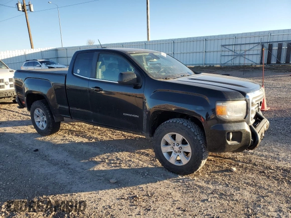 2015 GMC Canyon 4WD SLE with VIN 1GTH6BE37F1133213, listed as a Copart auction lot 82404014 with 142,149 mi miles and Salvage Title. Bid and sale history available at carsss.com. Image 4.