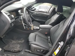 2024 BMW X4 M40i z VIN 5UX43DT09R9U93650, wystawiony jako Copart lot #50173205 z przebiegiem Nie podano mil oraz Szkody całkowita. Historia ofert i sprzedaży dostępna na DreamBid. Obrazek 7.