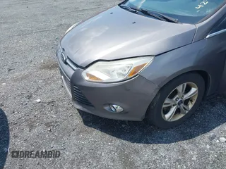 2014 Ford Focus SE z VIN 1FADP3K20EL188088, wystawiony jako IAAI lot #42455783 z przebiegiem 201 105 mil mil oraz . Historia ofert i sprzedaży dostępna na DreamBid. Obrazek 6.