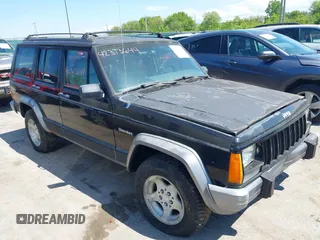 1995 Jeep Cherokee Country z VIN 1J4FJ78S9SL666002, wystawiony jako IAAI lot #42313644 z przebiegiem 226 914 mil mil oraz . Historia ofert i sprzedaży dostępna na DreamBid. Obrazek 1.
