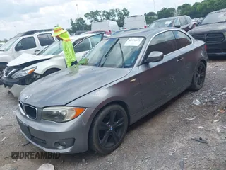 2012 BMW 1 Series 128i with VIN WBAUP9C56CVL90938, listed as a IAAI auction lot 42576072 with 135,234 mi miles and . Bid and sale history available at DreamBid. Image 2.
