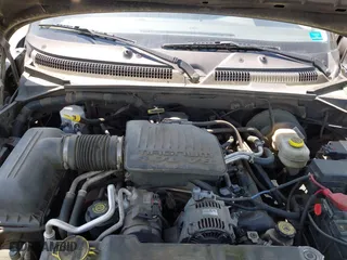 2004 Dodge Dakota SLT with VIN 1D7GL42N14S527342, listed as a IAAI auction lot 42081956 with 165,157 mi miles. Bid and sale history available at carsss.com. Image 10.