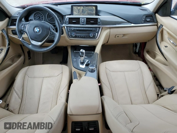 2014 BMW 3 Series 328i xDrive with VIN WBA3B3C59EJ977670, listed as a Copart auction lot 61997165 with 128,937 mi miles and Salvage title. Bid and sale history available at DreamBid. Image 8.