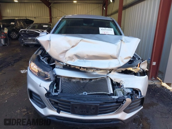 2020 Chevrolet Trax LS with VIN 3GNCJNSBXLL218869, listed as a IAAI auction lot 41654418 with 76,769 mi miles. Bid and sale history available at carsss.com. Image 6.