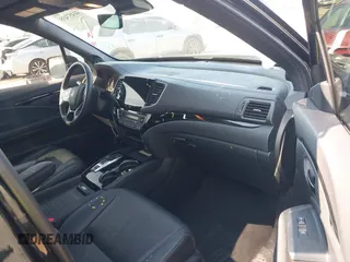 2023 Honda Passport Elite z VIN 5FNYF8H01PB005725, wystawiony jako IAAI lot #41457435 z przebiegiem 39 562 mil mil oraz . Historia ofert i sprzedaży dostępna na DreamBid. Obrazek 5.