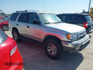 2000 Toyota 4Runner with VIN JT3GM84R4Y0057196, listed as a IAAI auction lot 42708411 with 320,366 mi miles and . Bid and sale history available at DreamBid. Image 1.