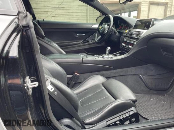 2016 BMW M6 z VIN WBS6G9C54GD932196, wystawiony jako Copart lot #53960063 z przebiegiem 46 162 mil mil oraz . Historia ofert i sprzedaży dostępna na DreamBid. Obrazek 5.