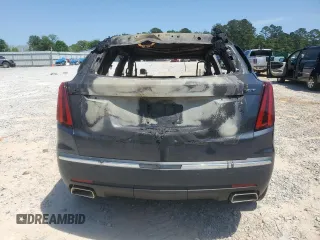 2021 Cadillac XT5 FWD Luxury with VIN 1GYKNAR40MZ144522, listed as a Copart auction lot 53457035 with Not provided miles and Non repairable. Bid and sale history available at DreamBid. Image 6.