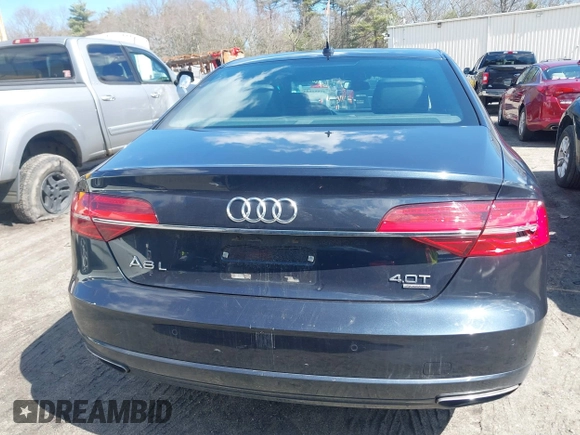 2016 Audi A8 L 4.0T Sport with VIN WAU43AFD1GN022253, listed as a IAAI auction lot 41858053 with 219,517 mi miles. Bid and sale history available at carsss.com. Image 16.