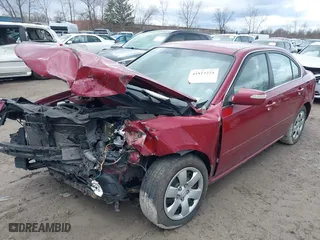 2009 Kia Optima LX with VIN KNAGE228295292892, listed as a IAAI auction lot 41812221 with 179,276 mi miles. Bid and sale history available at carsss.com. Image 6.
