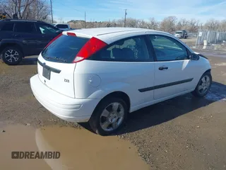 2003 Ford Focus ZX3 с VIN 3FAFP31333R106050, выставлен на аукционе IAAI как лот 41659209 с пробегом 116 753 миль миль и . История ставок и продаж доступна на DreamBid. Изображение 4.