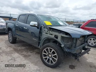 2019 GMC Canyon 4WD Denali with VIN 1GTG6EEN6K1354469, listed as a IAAI auction lot 41902101 with 27,096 mi miles. Bid and sale history available at carsss.com. Image 1.