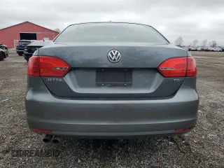 2014 Volkswagen Jetta Comfortline with VIN 3VWDL7AJ2EM399732, listed as a Copart auction lot 55946795 with 198,723 mi miles and Clean title. Bid and sale history available at DreamBid. Image 6.