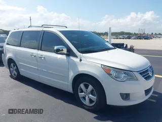 2012 Volkswagen Routan z VIN 2C4RVADG2CR120642, wystawiony jako IAAI lot #42354102 z przebiegiem 148 164 mil mil oraz . Historia ofert i sprzedaży dostępna na DreamBid. Obrazek 1.