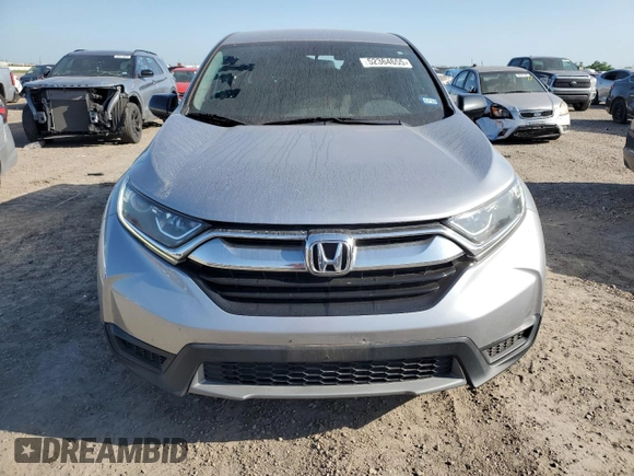 2019 Honda CR-V LX z VIN 2HKRW5H32KH421662, wystawiony jako Copart lot #52364655 z przebiegiem 108 182 mil mil oraz Szkoda całkowita • Salvage title. Historia ofert i sprzedaży dostępna na DreamBid. Obrazek 5.