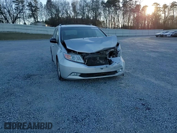 2012 Honda Odyssey Touring with VIN 5FNRL5H9XCB027758, listed as a Copart auction lot 86058504 with 164,860 mi miles and Salvage Title. Bid and sale history available at DreamBid. Image 11.