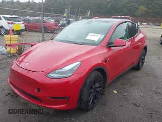 2023 Tesla Model Y Long Range with VIN 7SAYGAEE5PF685474, listed as a IAAI auction lot 40348773 with 26,605 mi miles and . Bid and sale history available at DreamBid. Image 2.