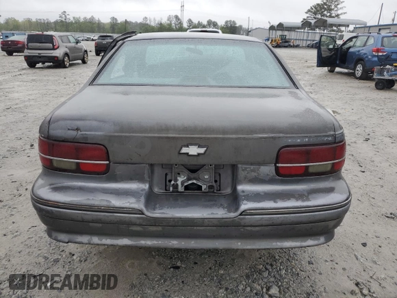 1991 Chevrolet Caprice z VIN 1G1BN53E1MW223013, wystawiony jako Copart lot #49857604 z przebiegiem 224 278 mil mil oraz Szkoda całkowita • Salvage title. Historia ofert i sprzedaży dostępna na DreamBid. Obrazek 6.